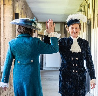 The previous High Sheriff high-fiving the new High Sheriff