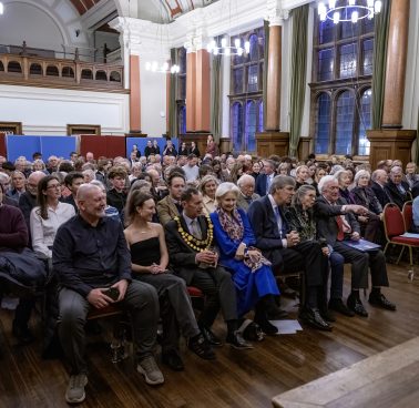 people sitting in a hall listening to the Shrieval Lecture